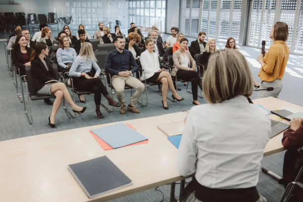Group of business people in the convention center.