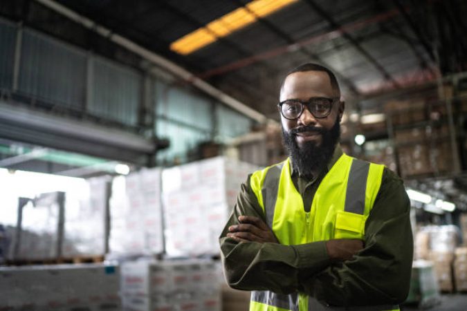 Logistics employee warehouse portrait