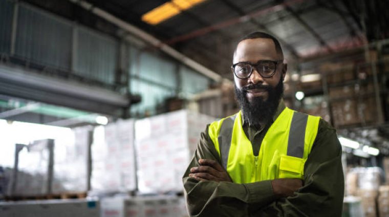 Logistics employee warehouse portrait