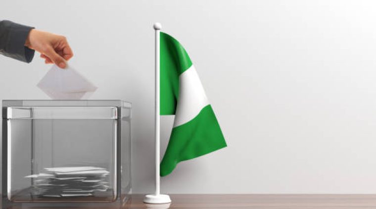 Glass ballot box and a small Nigeria flag. 3d illustration