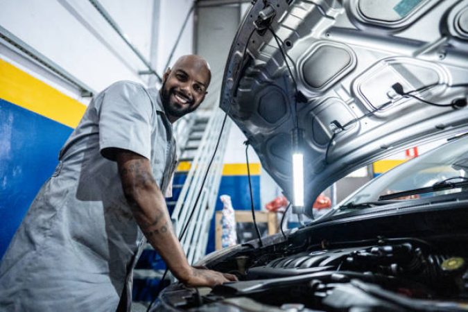 Portrait of a mechanic in an auto repair shop