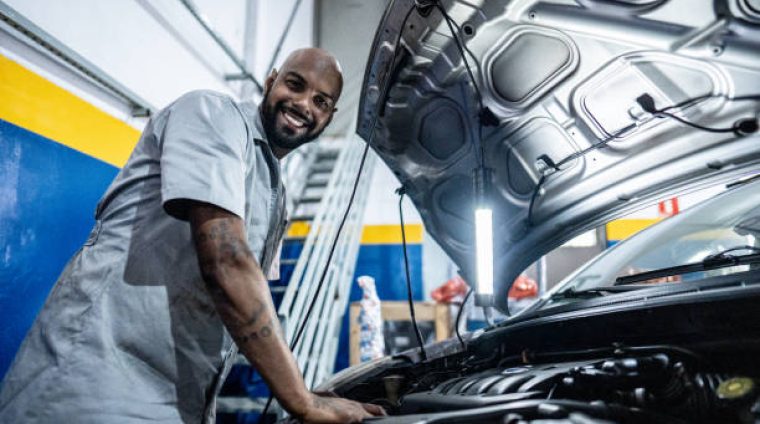 Portrait of a mechanic in an auto repair shop