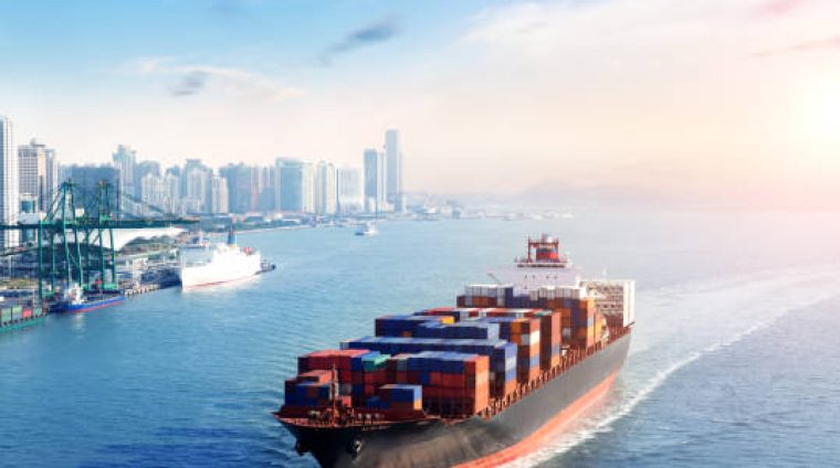 Large cargo container ship arriving in port